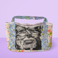 a tote bag with a portrait of a man on it